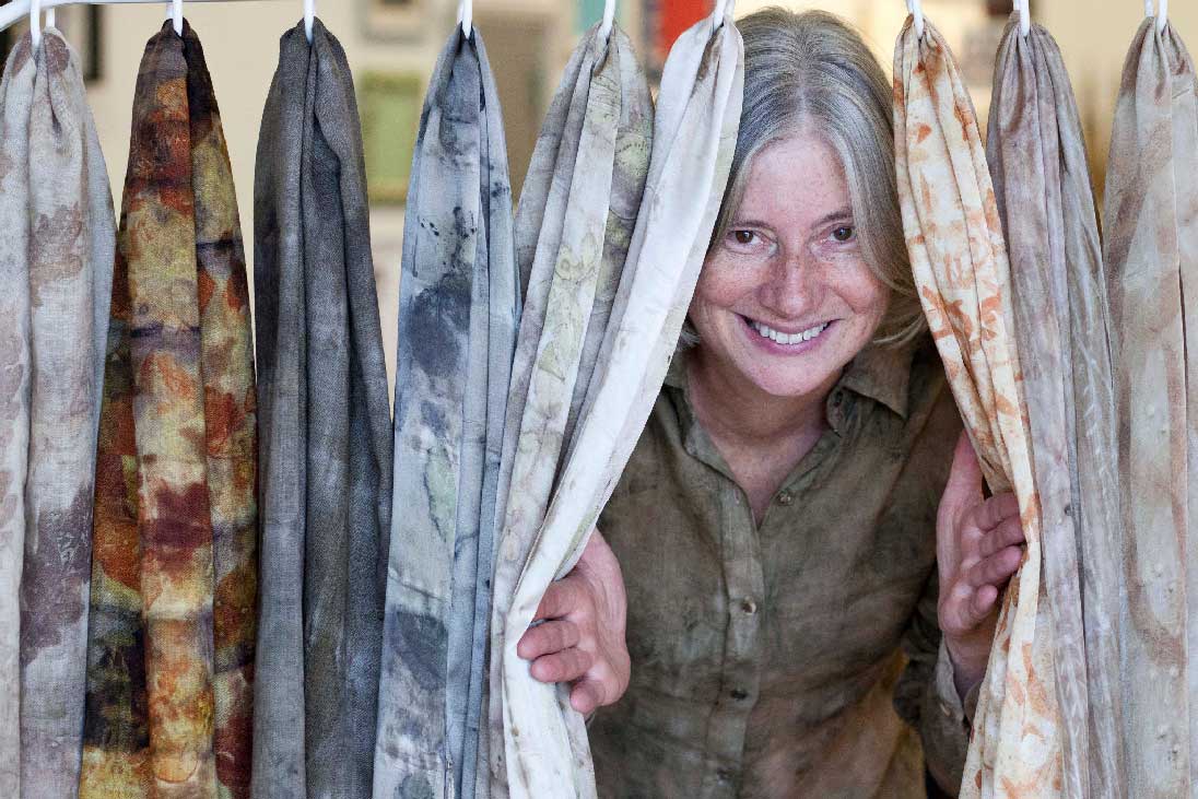 Nicola with a selection of eco printed scarves